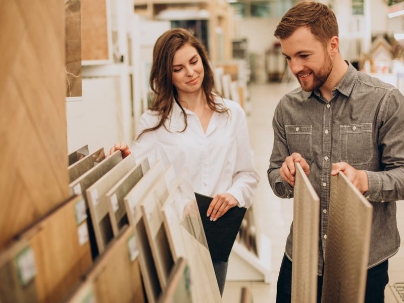 Browsing flooring samples in a local showroom